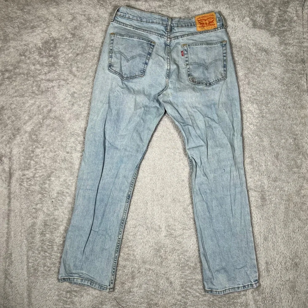 Levis 514 Straight Fit Jeans Mens 33x30 Light Wash Blue Denim trash distressed